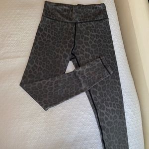 Light grey/green leggings. Cheetah pattern